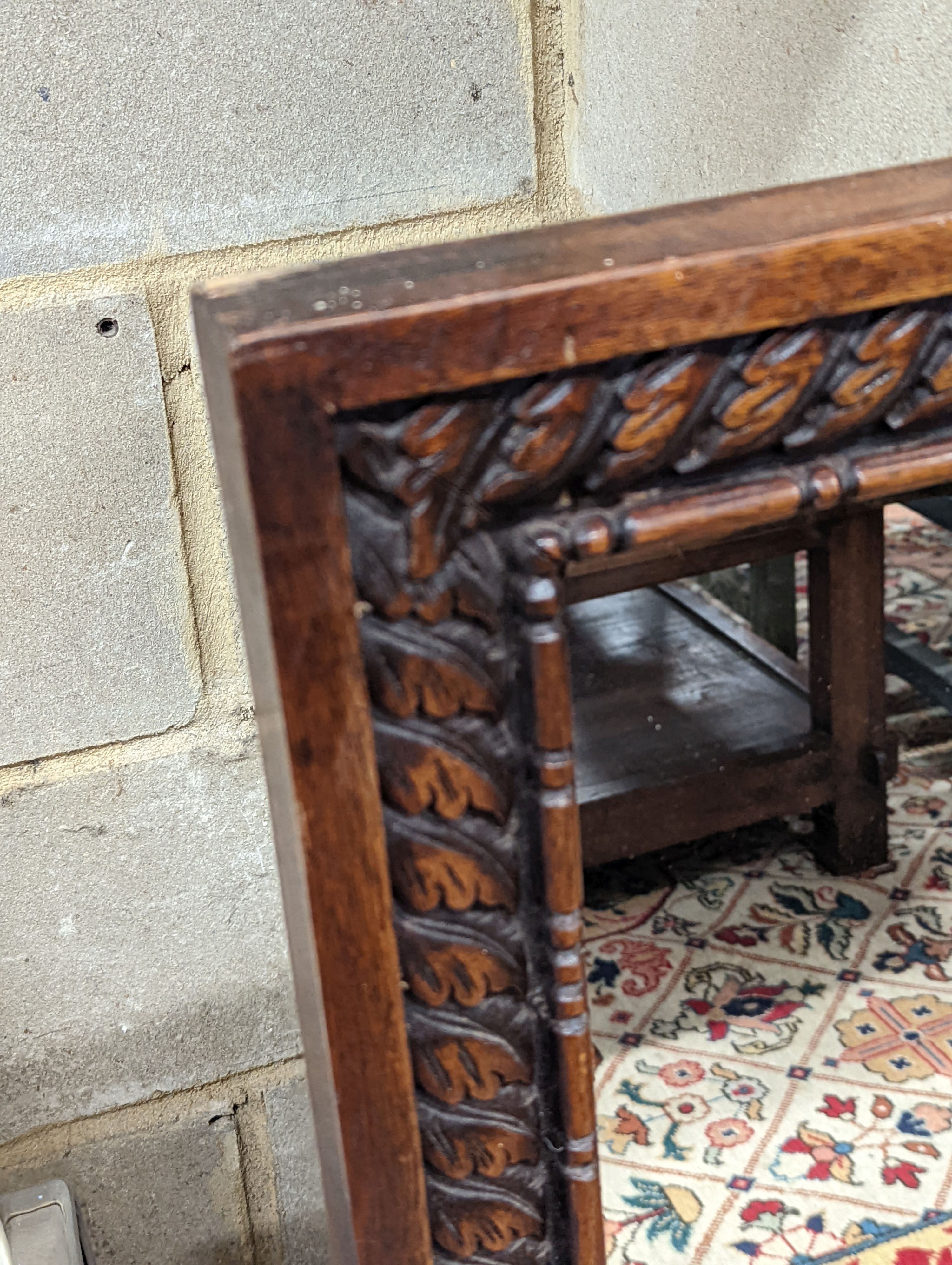A carved mahogany rectangular wall mirror, width 82cm, height 110cm